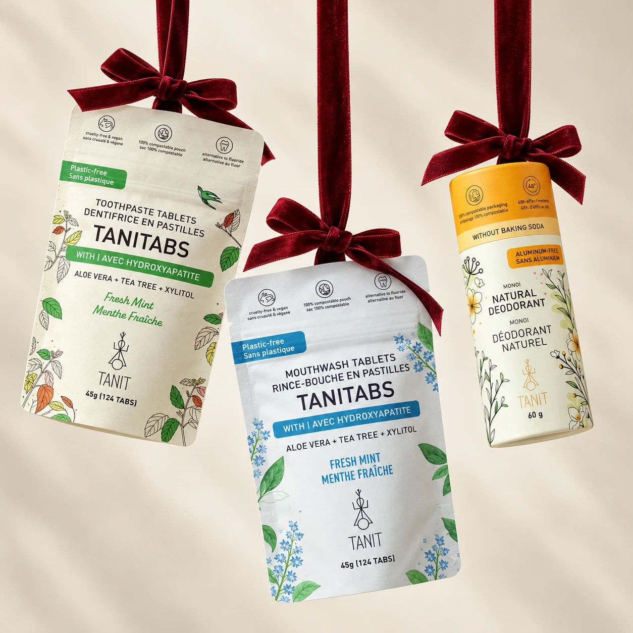 TANIT toothpaste tablets, mouthwash tablets and deodorant styled with burgundy velvet ribbons